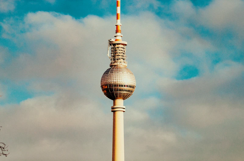 A tall tower with a sky background